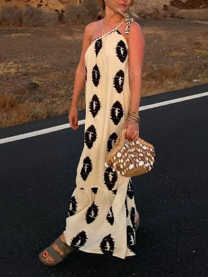 Luźna sukienka maxi na jedno ramię ze słonecznym nadrukiem w etnicznym kolorze