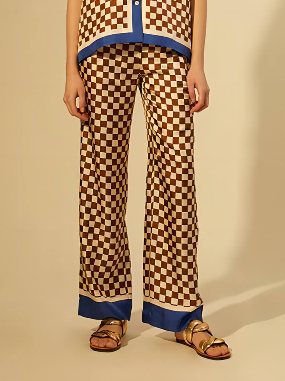 Calças elásticas soltas com estampa xadrez exclusiva e listras azuis