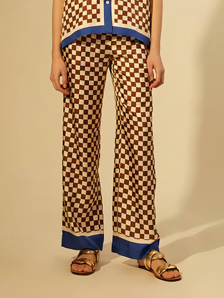 Einzigartige, lockere, elastische Hose mit Schachbrettmuster und blauen Streifen