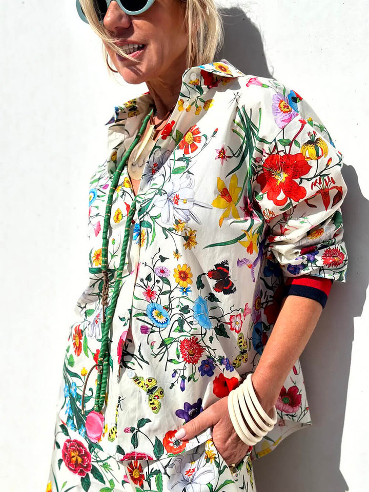 Blusa extragrande con botones y estampado floral único