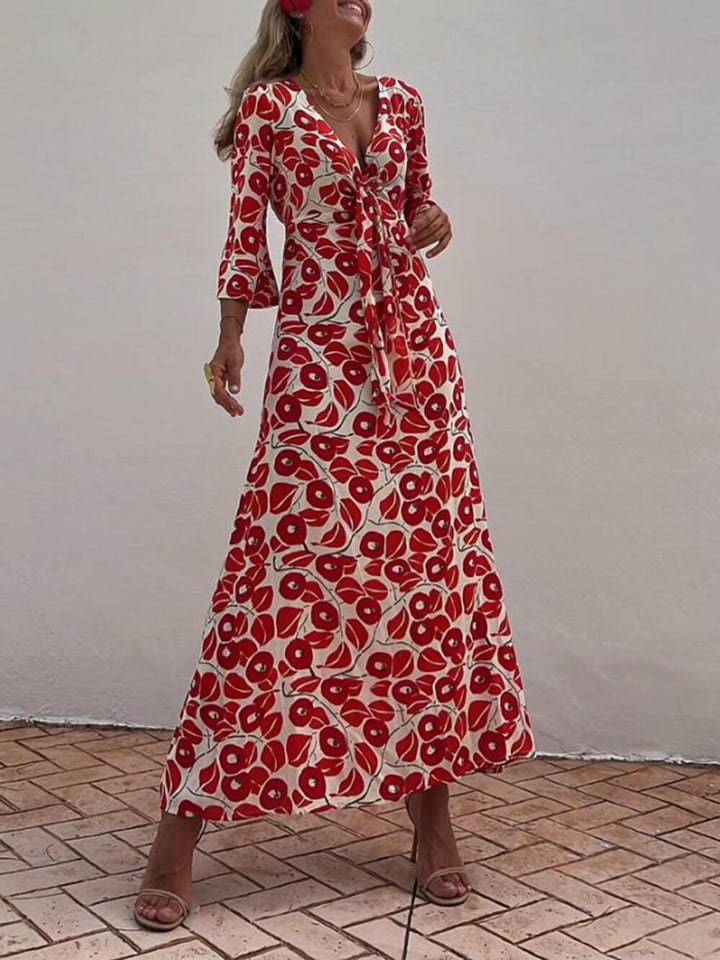 Wakacyjna sukienka maxi z kwiatowym nadrukiem i kieszeniami na ramionach