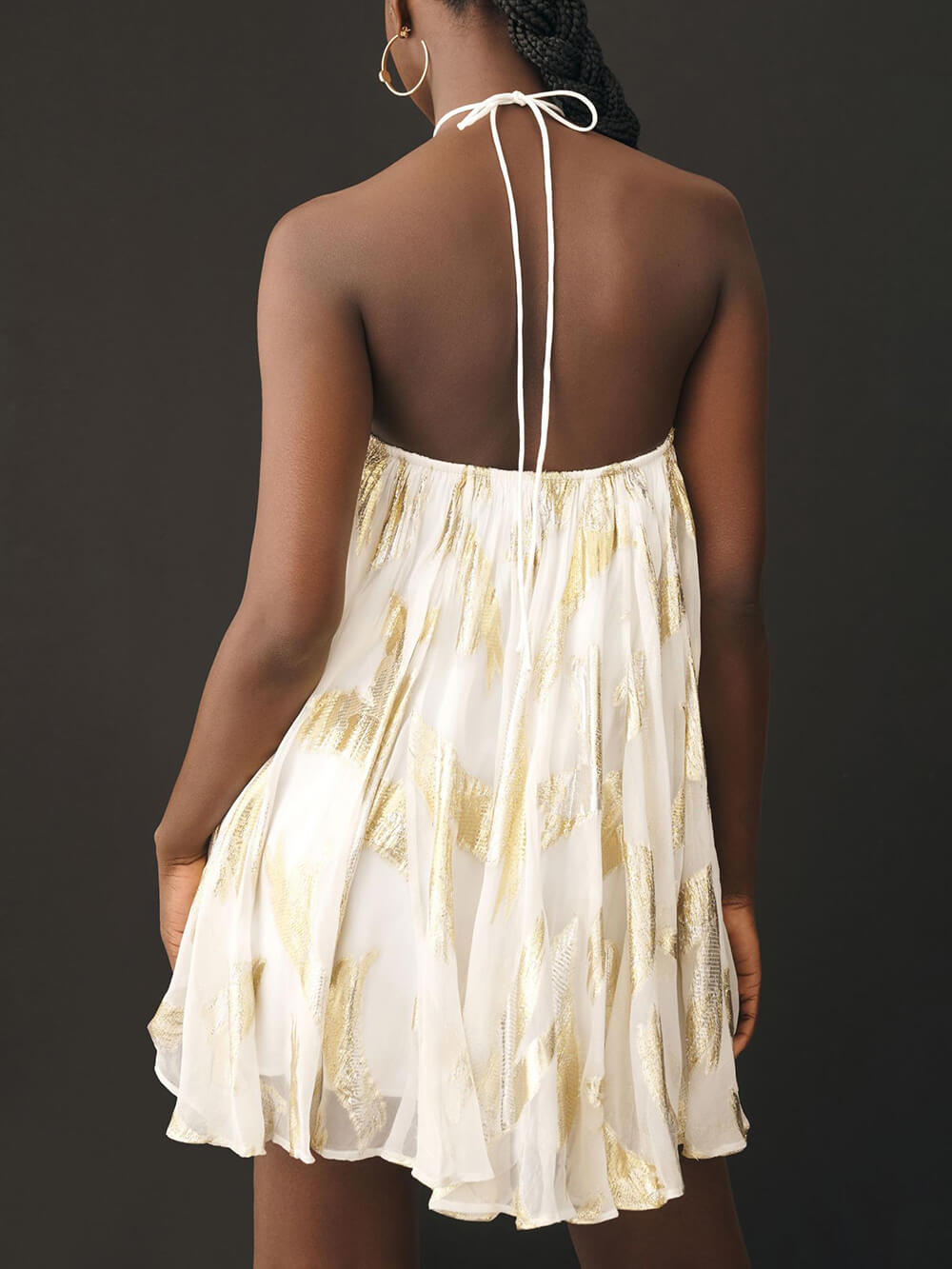 Mini-robe trapèze imprimée à col suspendu et paillettes