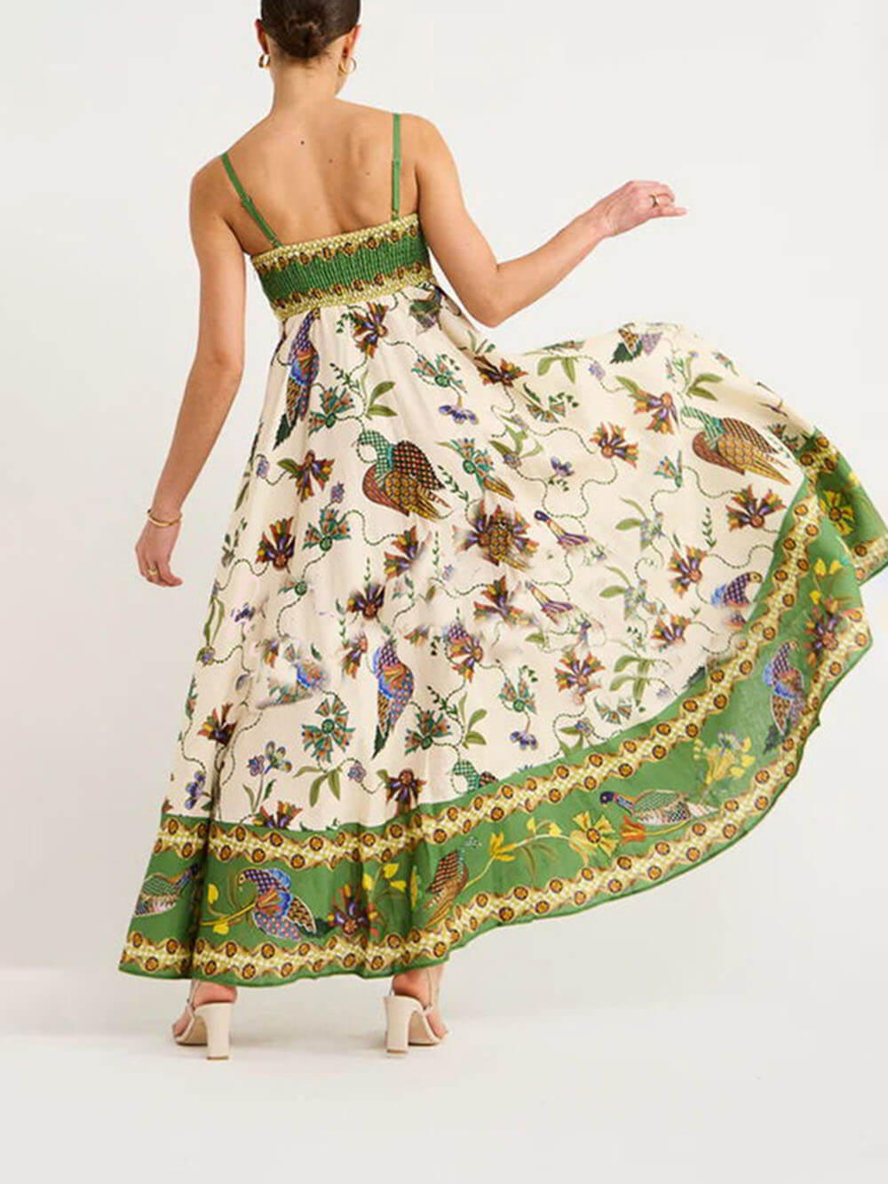 Zonovergoten jurk met unieke print en gesmokte achterkant