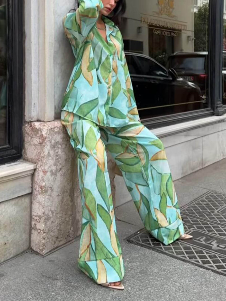 Exquisite, einzigartige Hose mit weitem Bein und elastischen Taschen und Palmblatt-Print