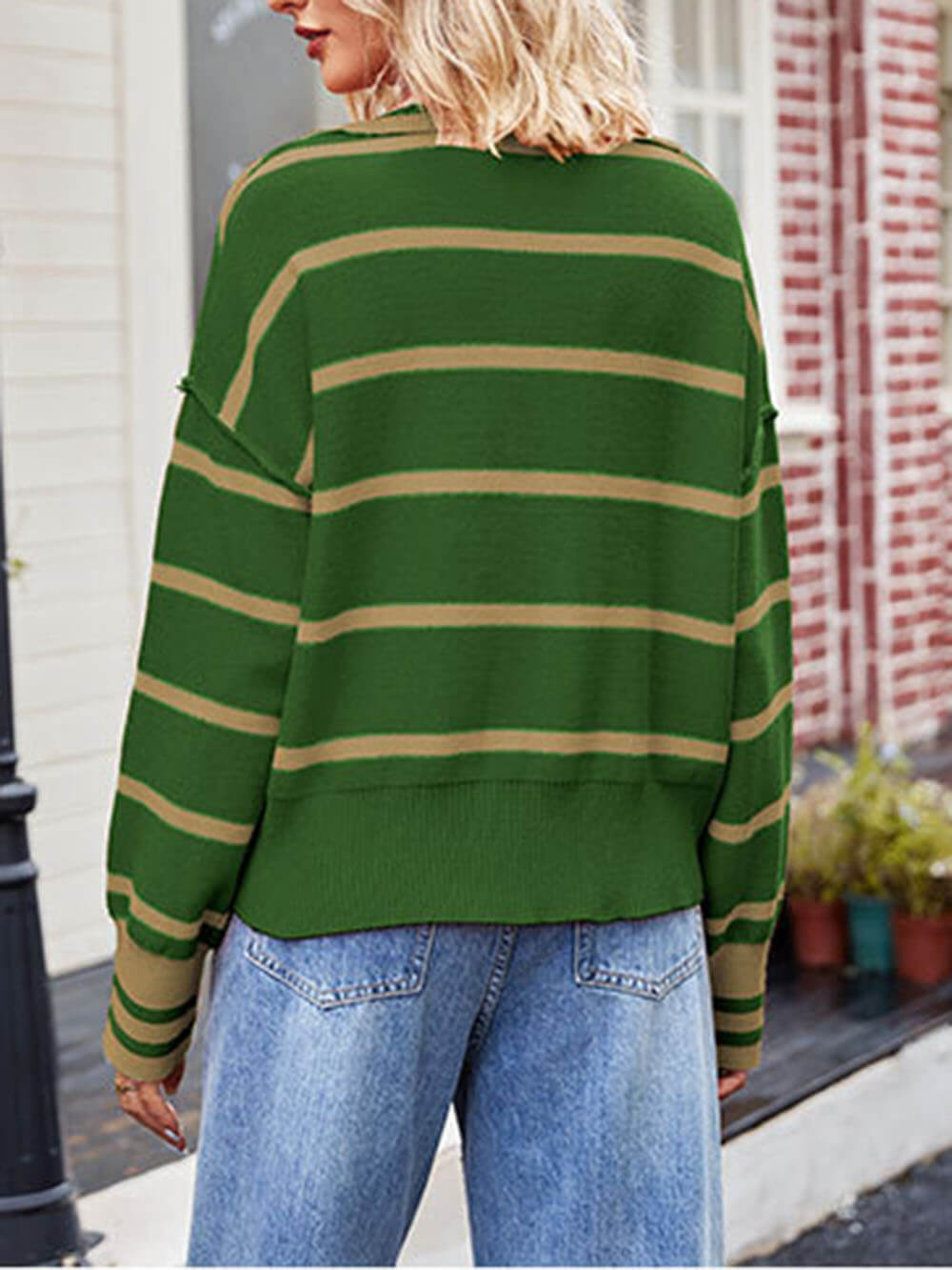 Patchworkowy sweter w paski z klapami