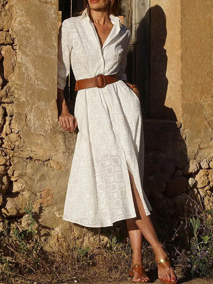 Midi-jurk met geruite print, riem, knoopzak en lange mouwen
