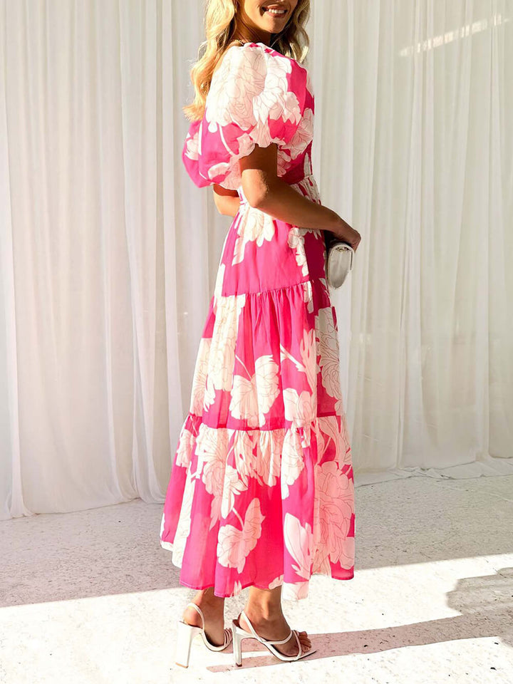 فستان ماكسي ذو ثنيات وطبعات زهور فريدة من نوعها