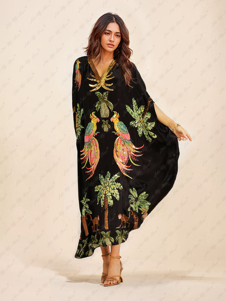 Unik kjole med printet kokosnøddetræ og dråbeformede skuldre