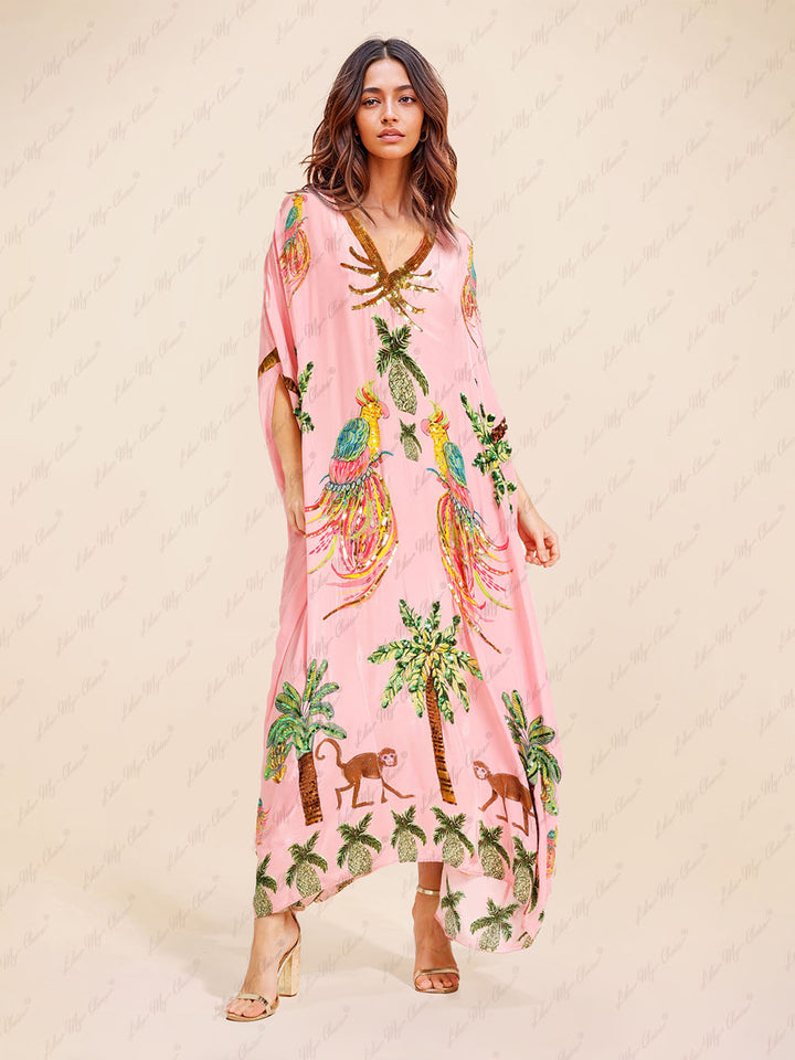 Unieke jurk met druppelvormige mouwen en kokosnootboomprint