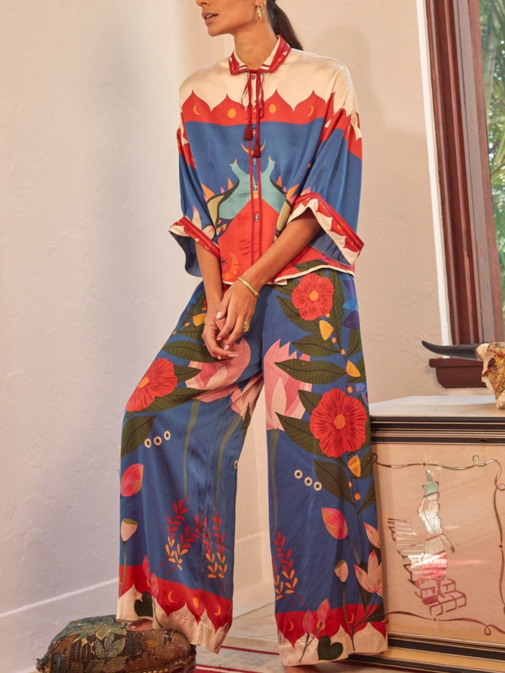 Topp med spridd krage i kimono-stil
