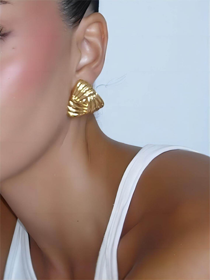 Einfache und vielseitige Ohrringe aus geometrischem Metall