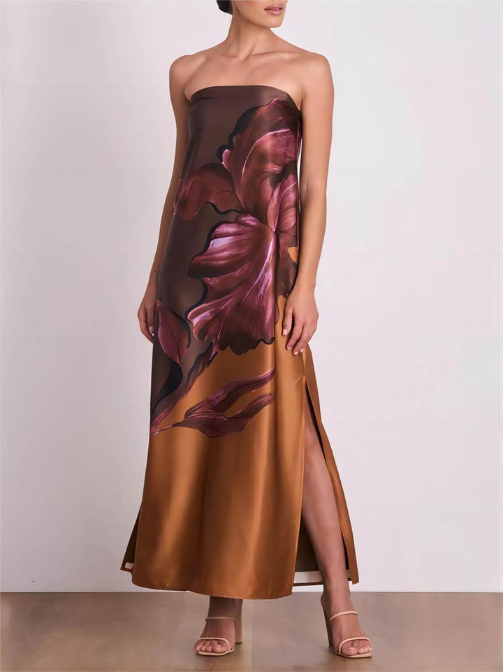 Stylowa, kontrastowa sukienka maxi z odkrytymi ramionami i kwiatowym nadrukiem