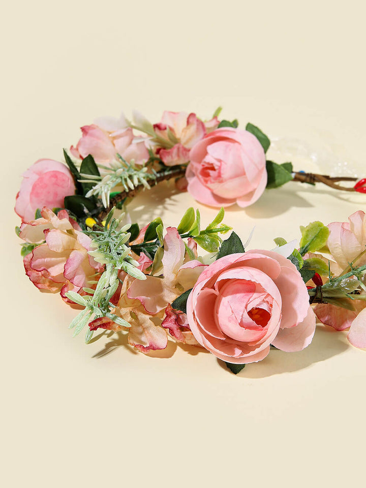 Coroa de flores de rosa ruborizada