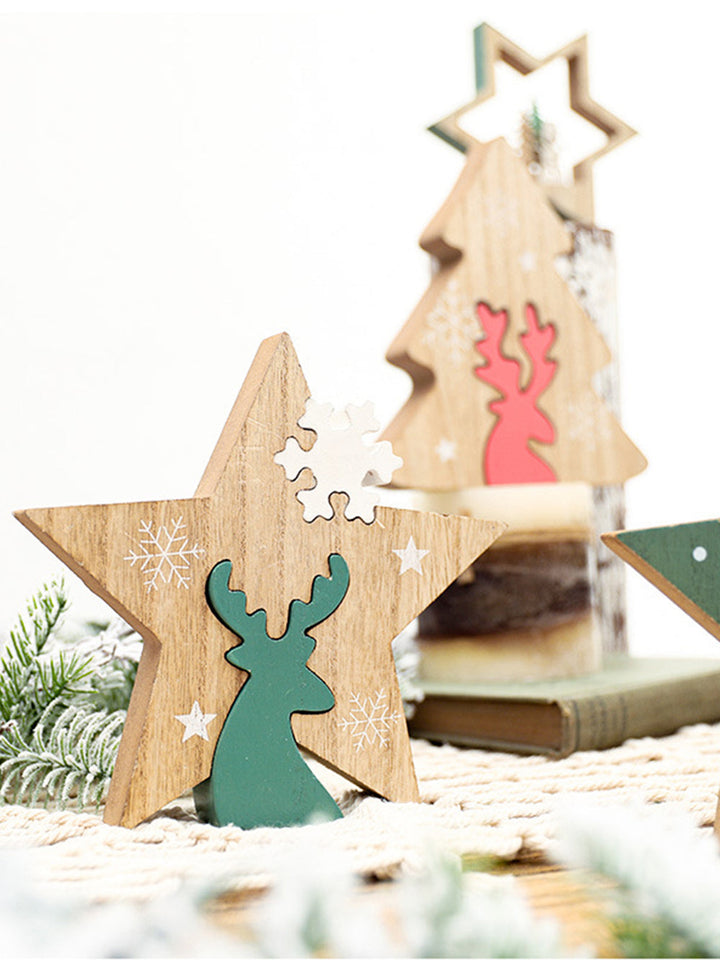 Escena navideña con decoración de alces y pentagrama.