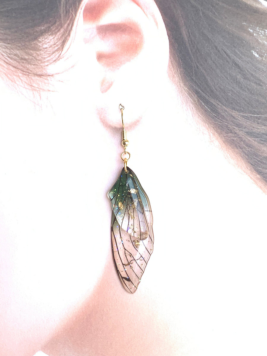 Boucles d'oreilles faites à la main d'aile de papillon