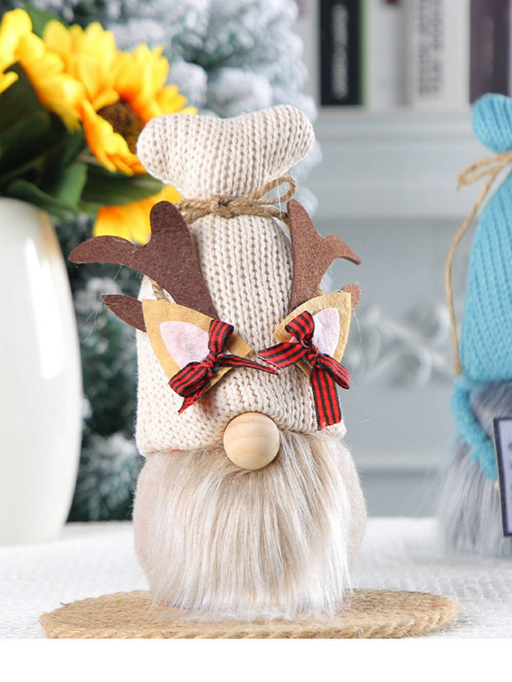 Ornamento natalizio per bambola senza volto lavorato a maglia