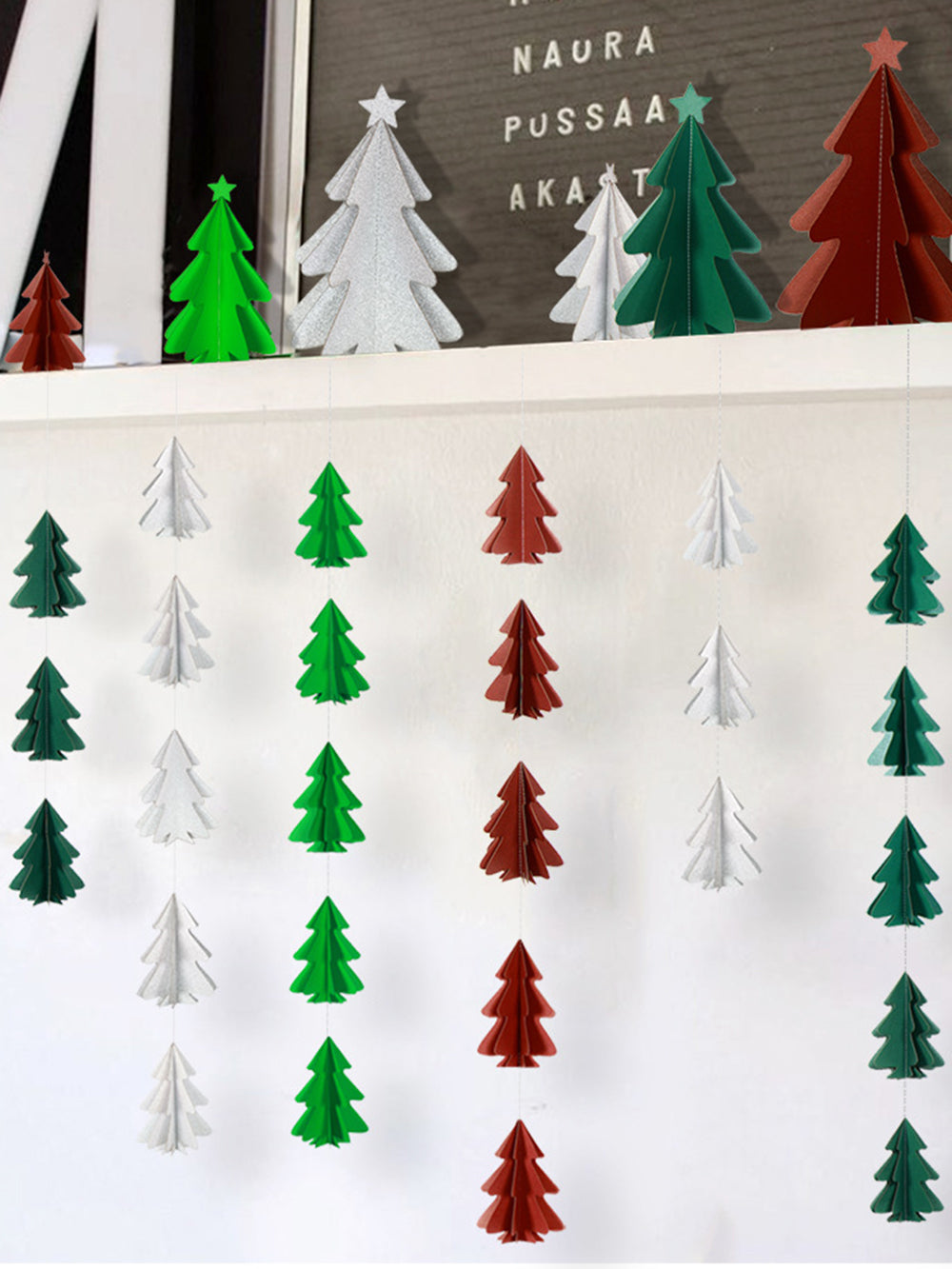 Mini Christmas Tree With Paper String Flowers And Hanging Flags
