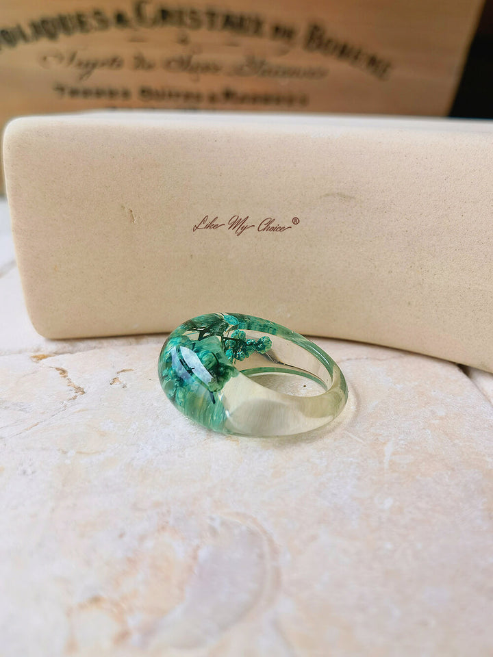 Dried flower resin ring with green flowers