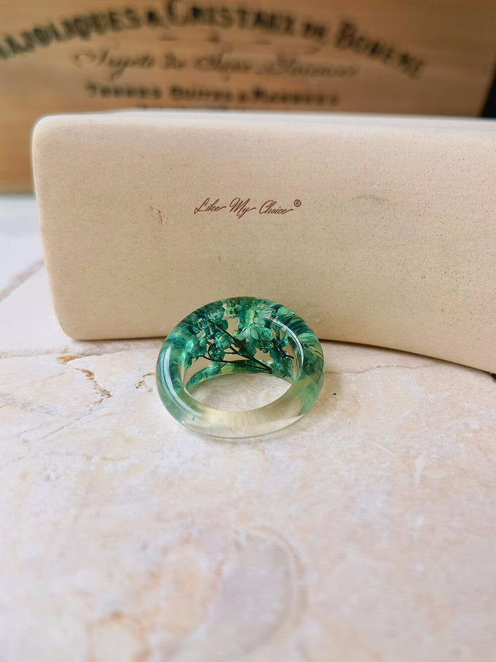 Dried flower resin ring with green flowers