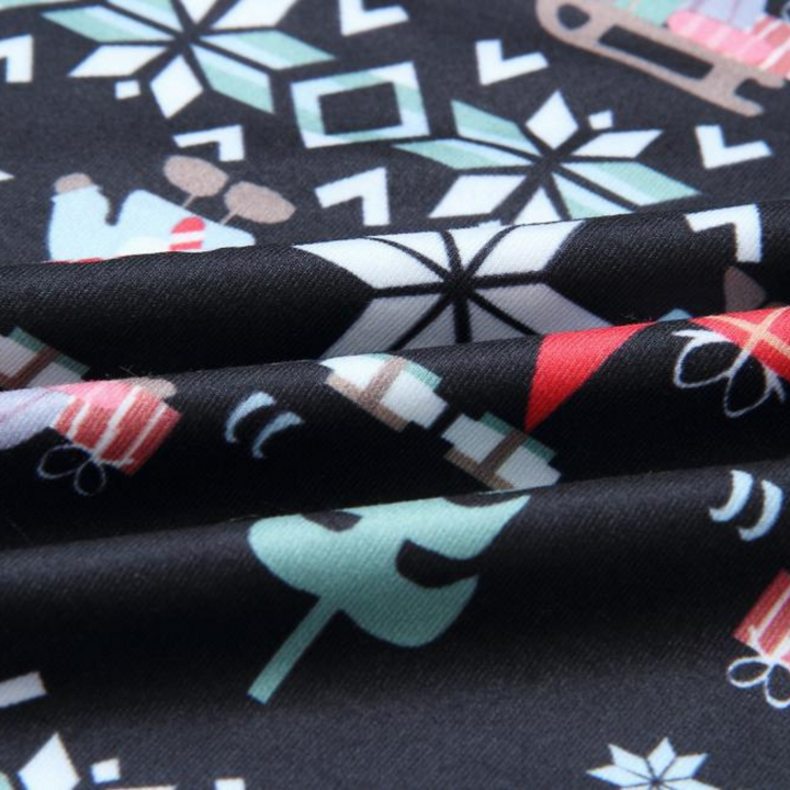 Leuke bijpassende pyjamasets met kerstman en sneeuwvlokprint