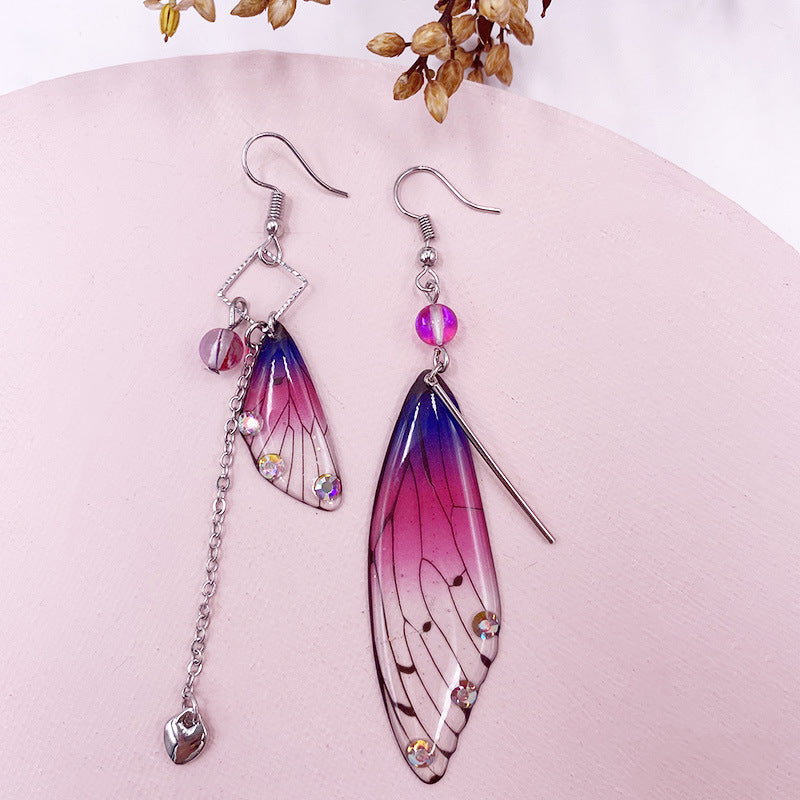 Pendientes de borla de ala de cigarra con lámina de oro púrpura y ala de mariposa