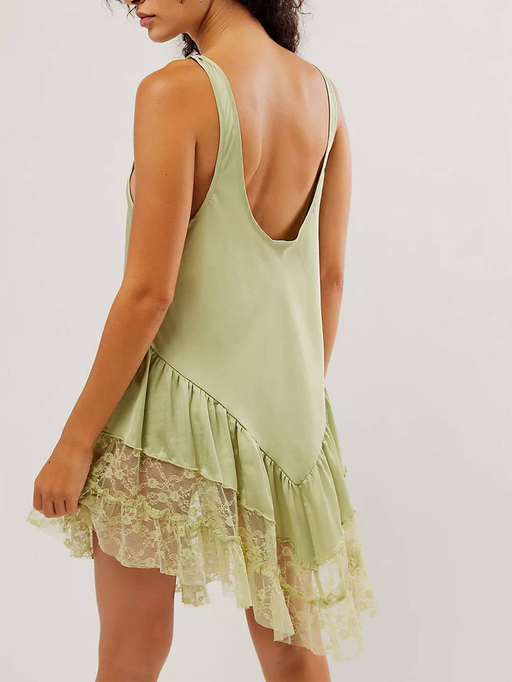 Mouwloze mini-jurk met kanten paneel