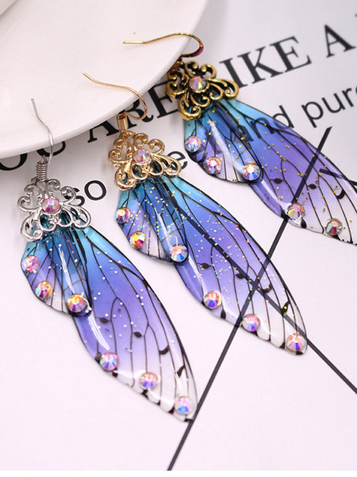 Orecchini in cristallo con ala di cicala con strass blu e ala di farfalla