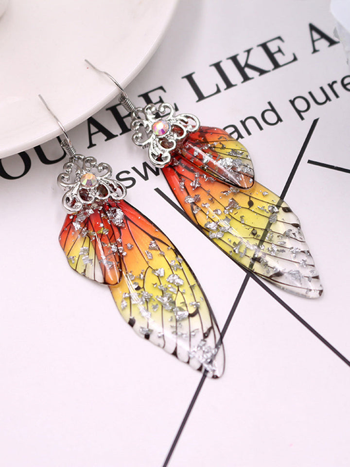 Pendientes de cristal de ala de cigarra con diamantes de imitación amarillos con alas de mariposa