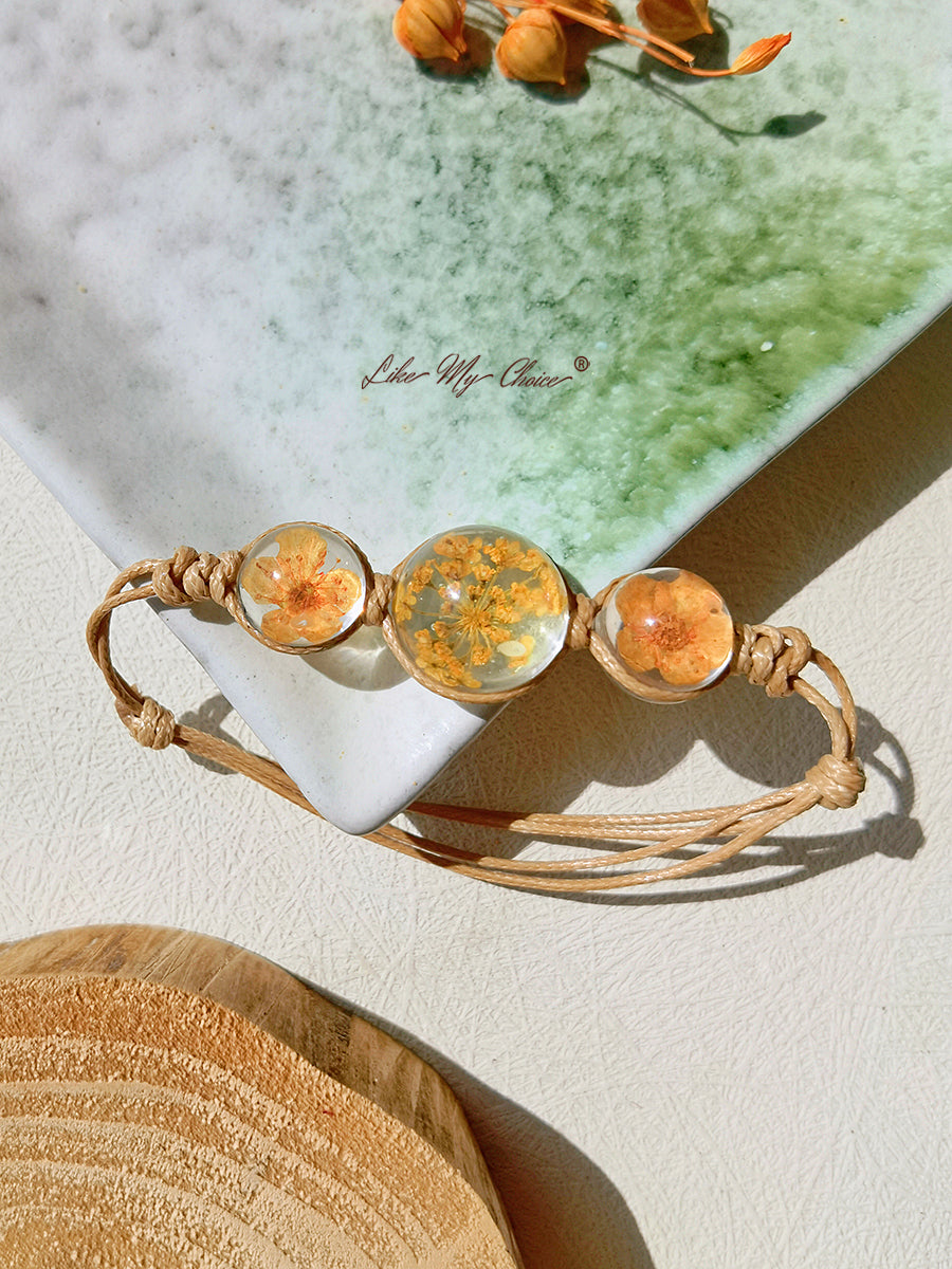 Bracelet jonc à brins de corde réglables avec couvercle en verre de pierres précieuses en fleurs de cerisier