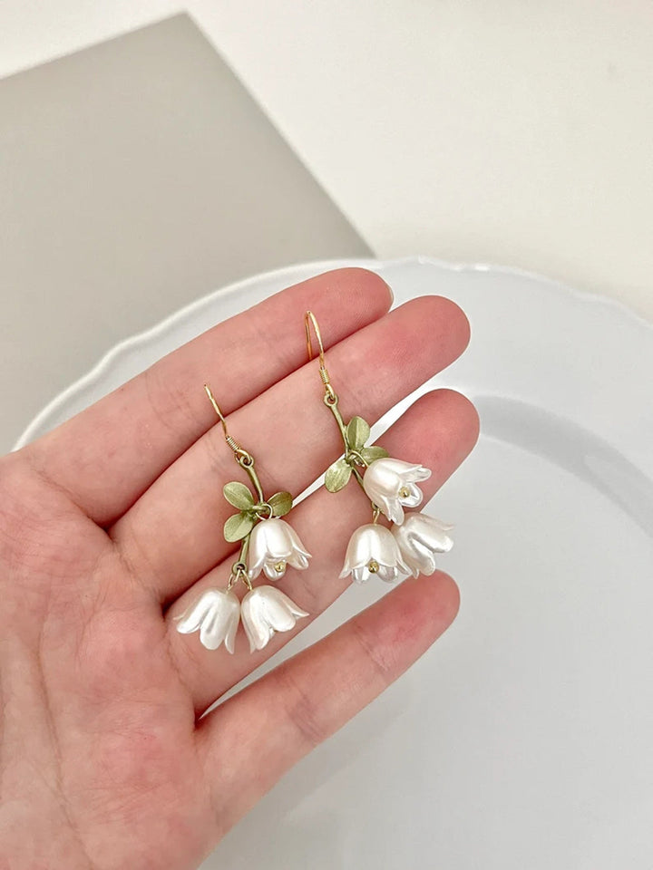 Lindos brincos de borla - Tulipas arco branco flores de fada