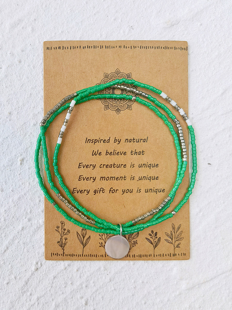 Verstelbare armband met trekkoord en kralen, smaragdgroene parel