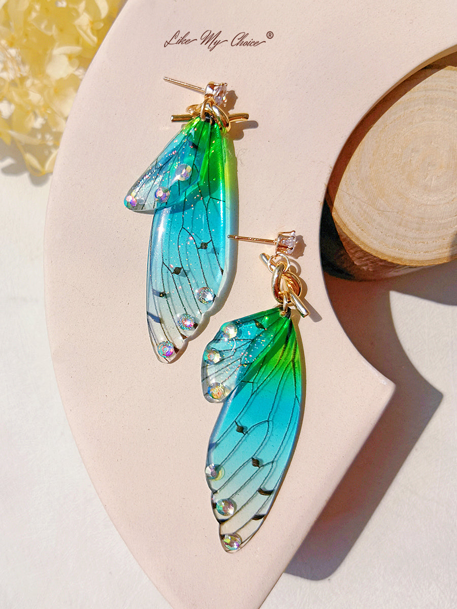 Pendiente asimétrico con alas de mariposa Pendiente de diamantes de cristal