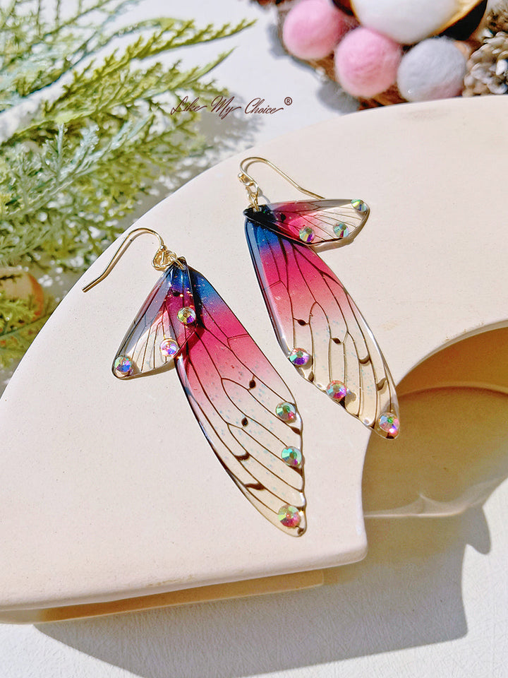 Boucle d'oreille en diamant en cristal faite à la main avec aile de papillon