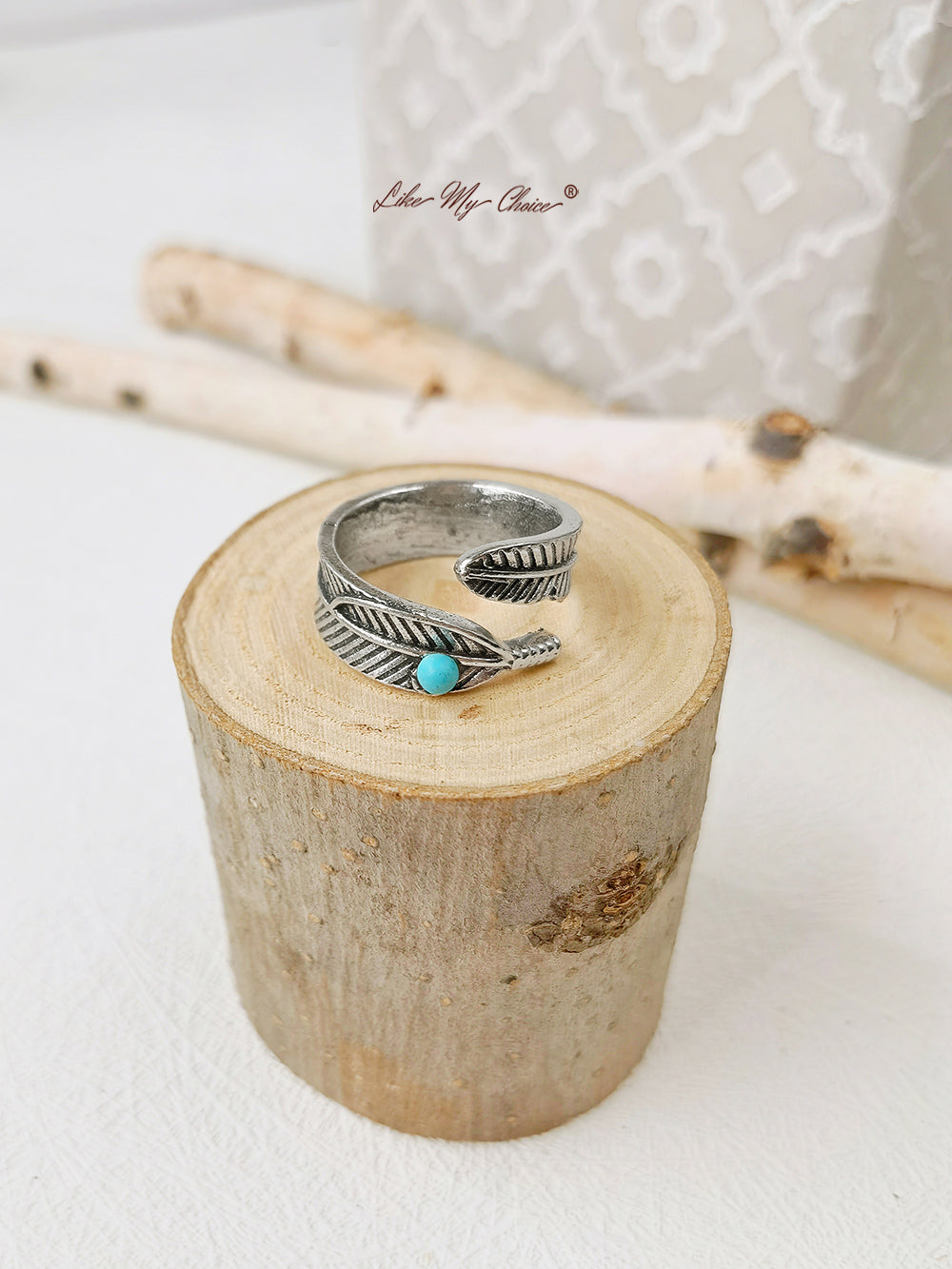 Srebrny pierścionek z turkusowym piórem Boho