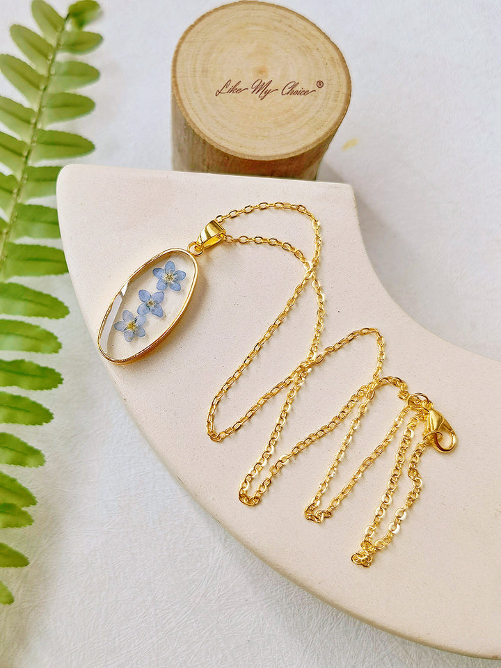 Forget Me Not Golden Oval Pendant  Natural Resin Necklace