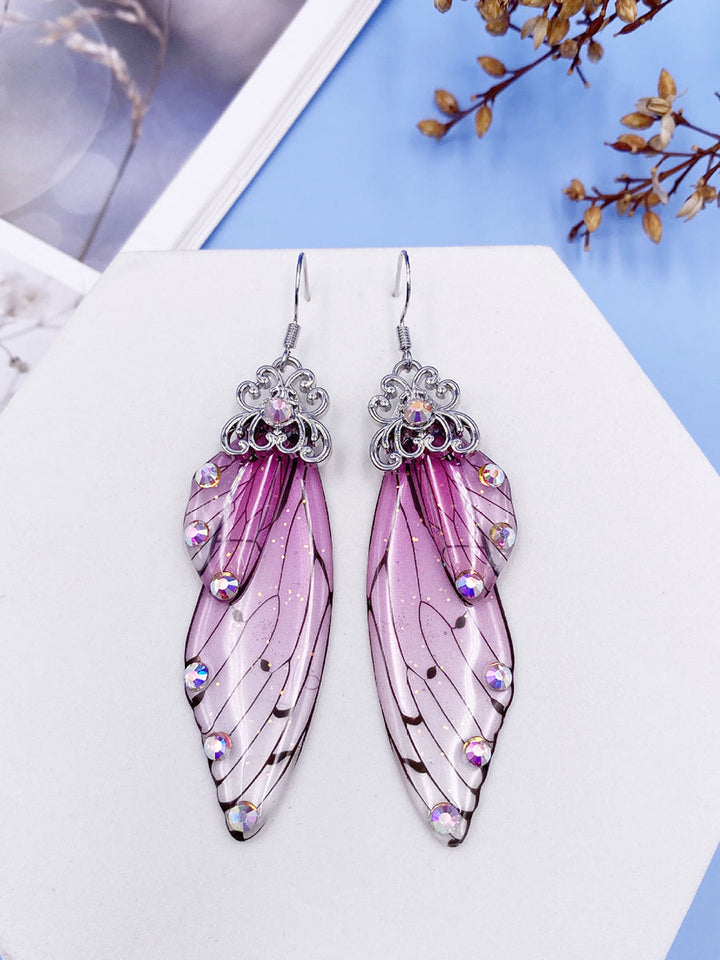 Pendientes de cristal de ala de cigarra con diamantes de imitación rosa y ala de mariposa
