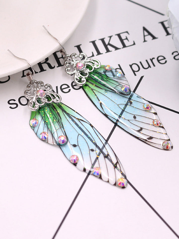 Boucles d'oreilles en cristal d'aile de cigale en strass vert avec aile de papillon