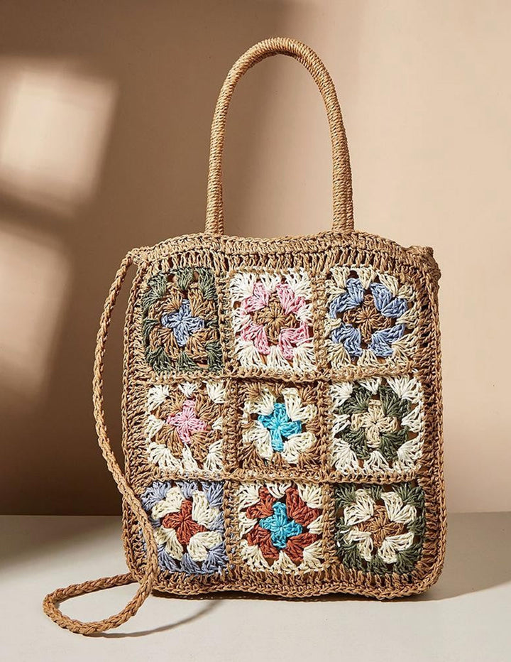 Bolso de paja tejida con flores de colores