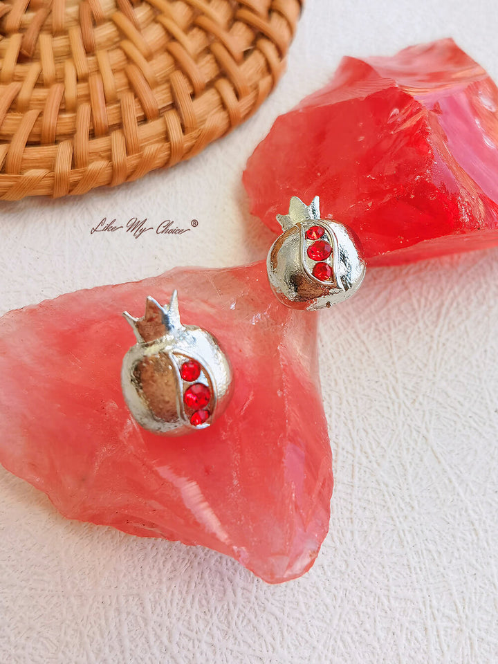 Boucle d'oreille en argent rubis avec motif couronne de grenade