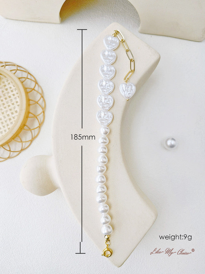 Asymetryczna bransoletka T-Bar z perłami w kształcie serca