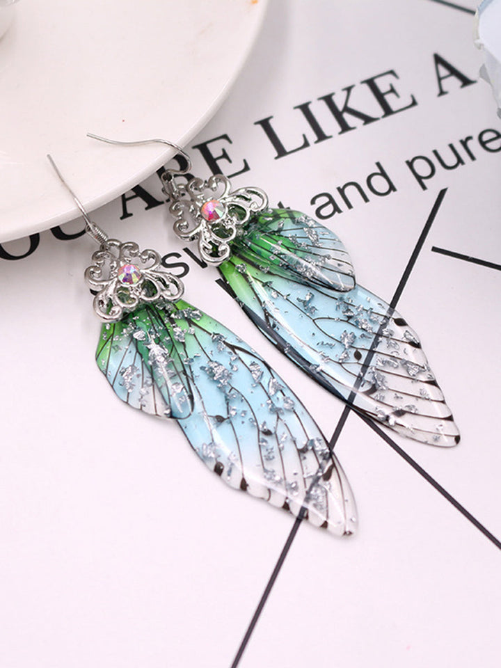 Pendientes de cristal de ala de cigarra con diamantes de imitación verdes y alas de mariposa