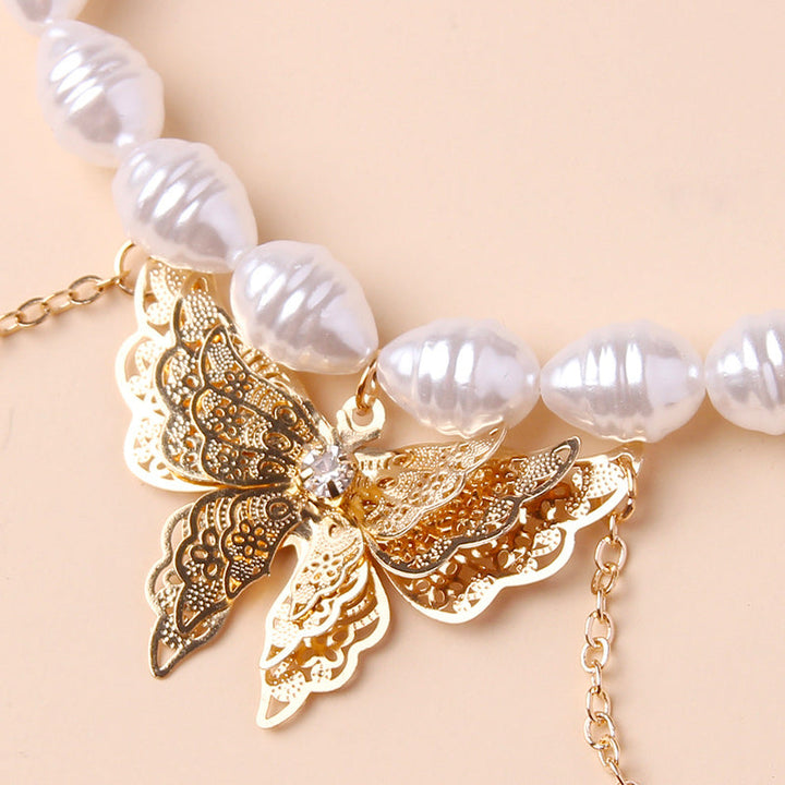 Collier pendentif papillon perle
