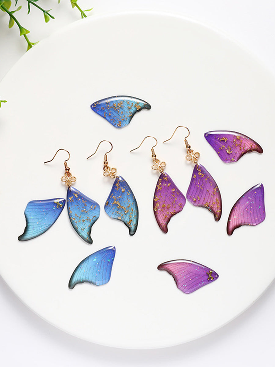 Πολύχρωμα φτερά πεταλούδας εποξειδικά σκουλαρίκια από χρυσό φύλλο