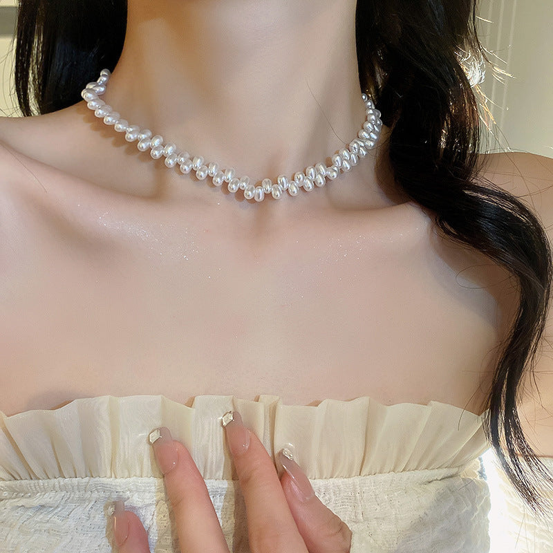 Collar largo con colgante de perlas