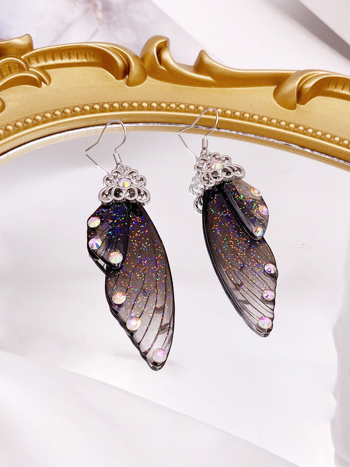 Orecchini in cristallo con ala di cicala con strass neri e ala di farfalla