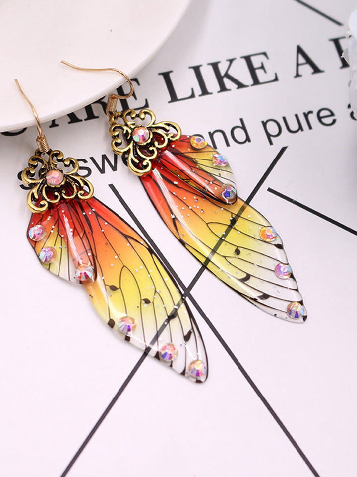 Boucles d'oreilles en cristal d'aile de cigale en strass jaune avec aile de papillon