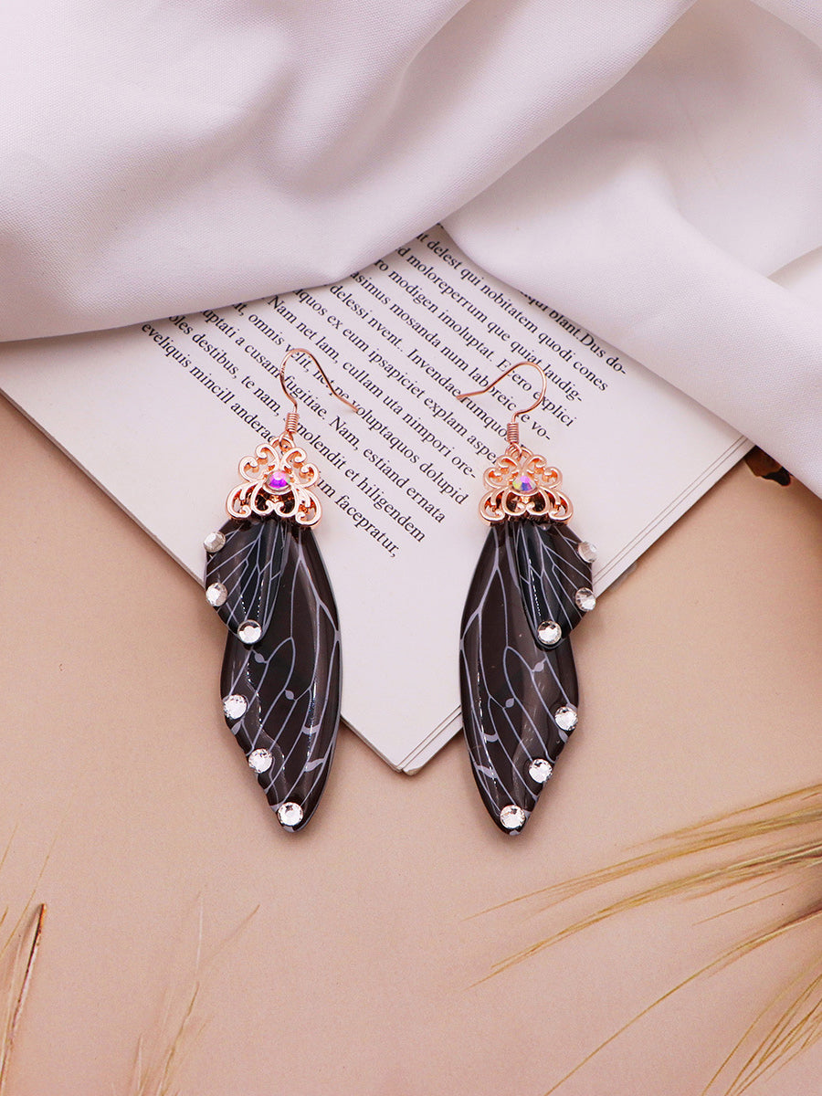 Pendientes de cristal con alas de cigarra y diamantes de imitación negros con alas de mariposa