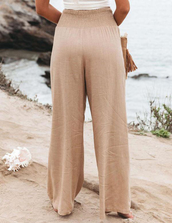 Pantalones de lino de pernera ancha con costura lateral y cintura fruncida