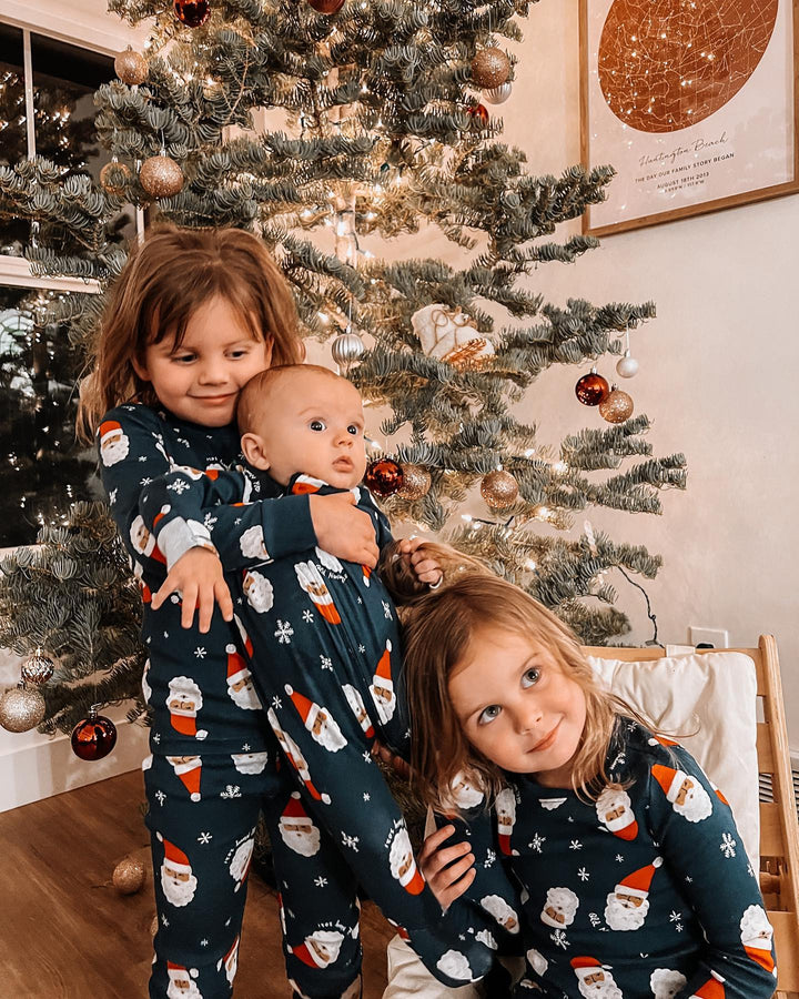 Pijama combinando para a família com capuz de Papai Noel